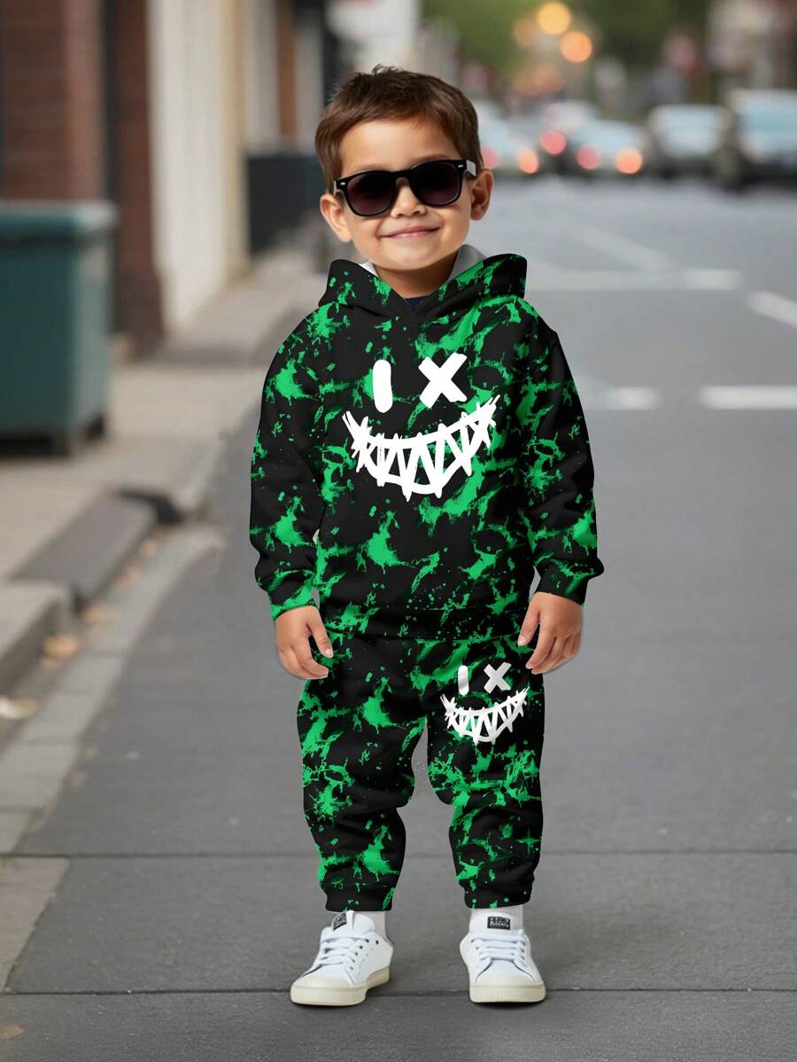 SHEIN Set de 2 piezas para niños pequeños: sudadera con capucha holgada con estampado gráfico y pantalones, estilo deportivo de ocio con estampado de sonrisa malvada