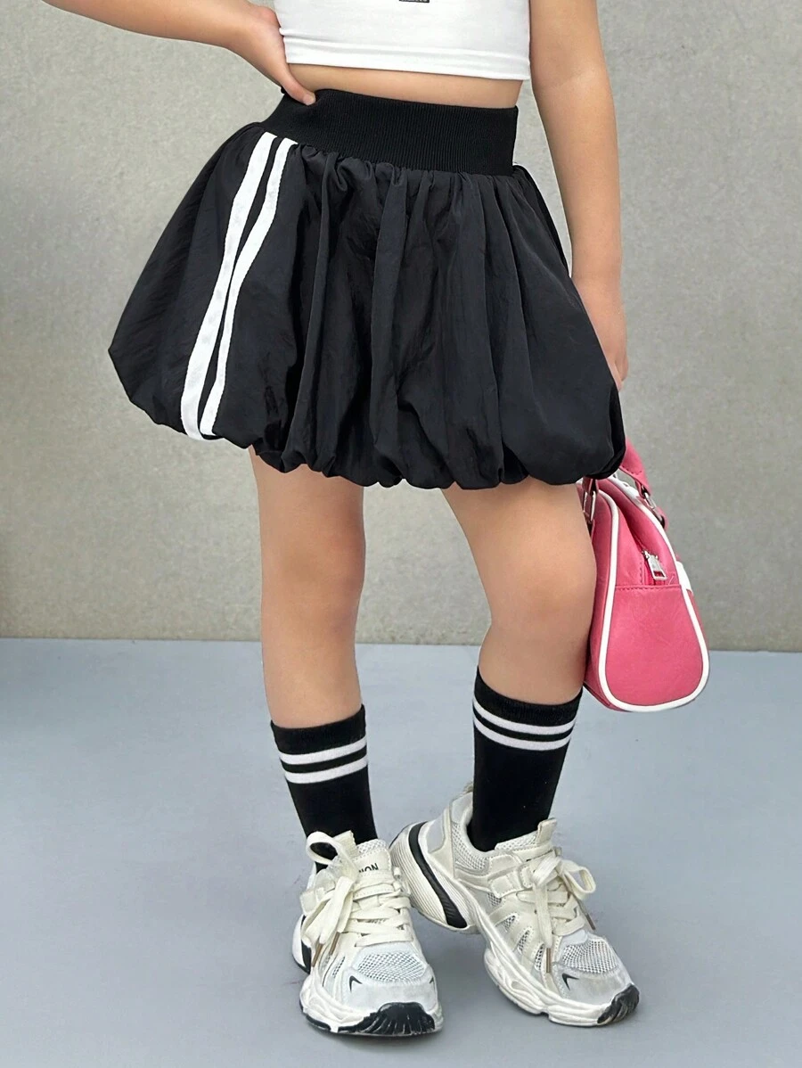 SHEIN Falda corta casual de estilo de calle de moda para niña joven Nova Glow