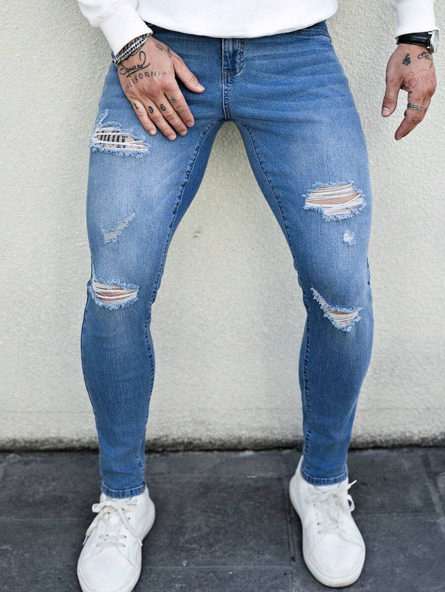 Manfinity LEGND Jeans de calle ajustados y entallados de color azul claro para hombres