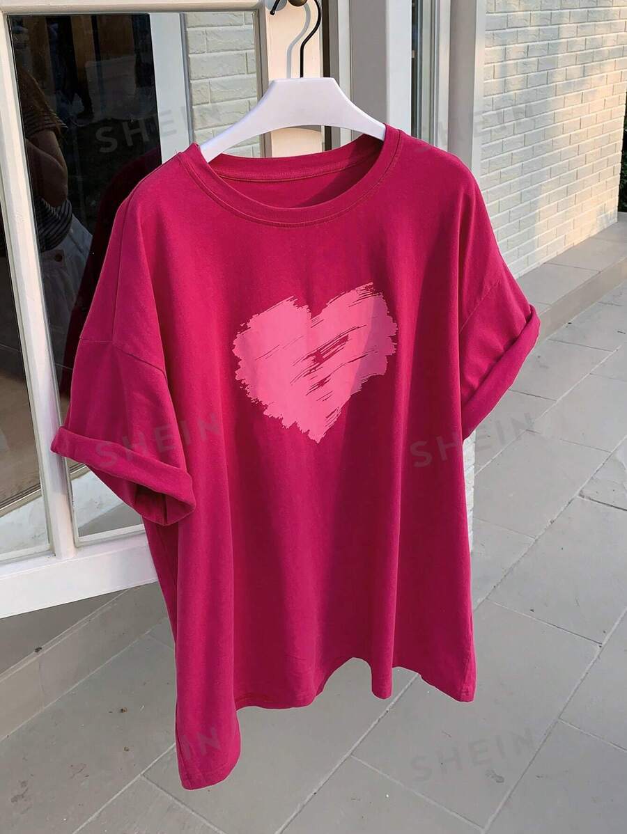 DAZY Camiseta informal de mujer de manga corta con cuello redondo holgada y estampado de corazones, camisetas gráficas