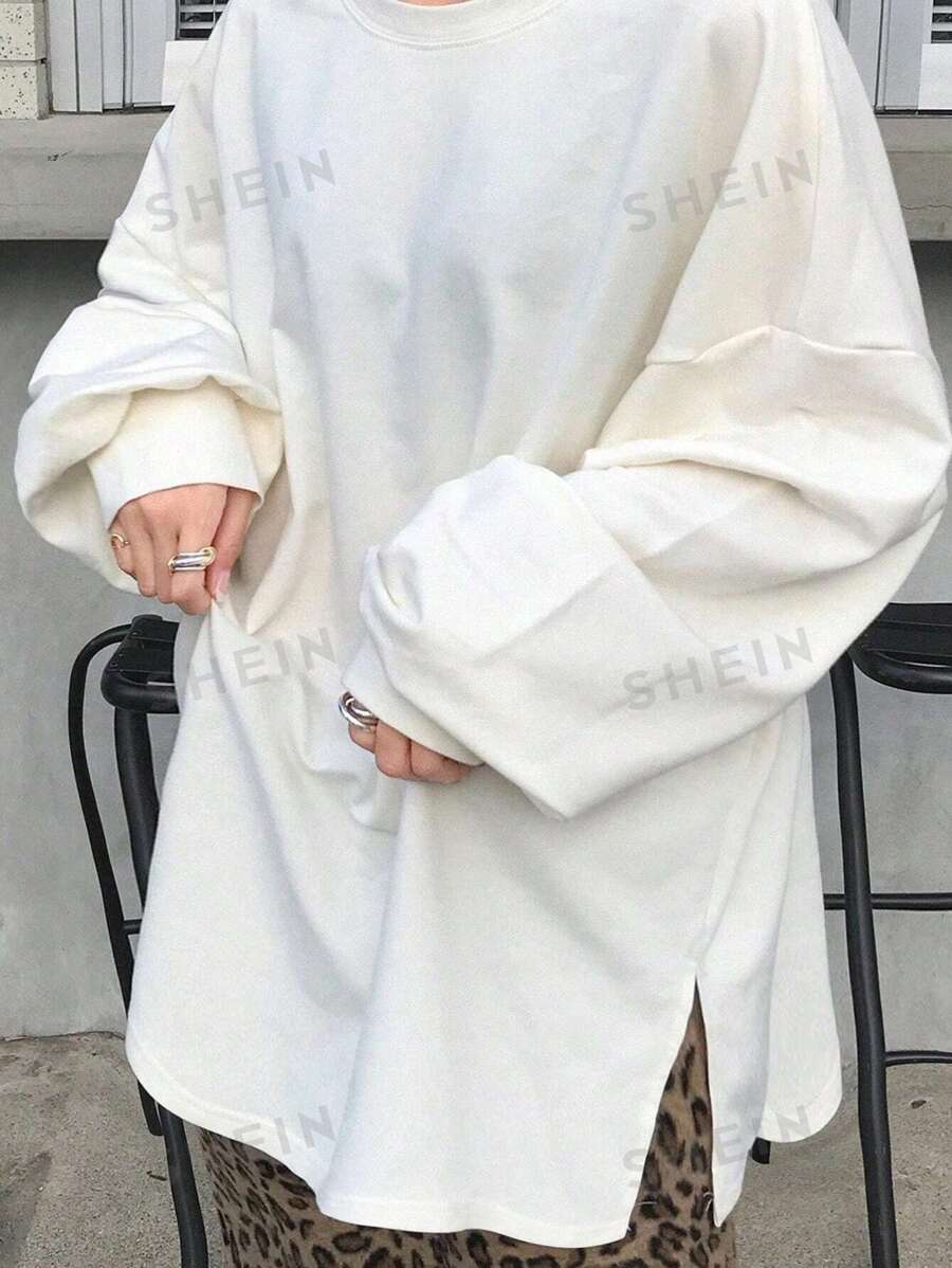 FRIFUL Camiseta básica larga de manga larga con cuello redondo, bajo dividido y corte oversize en color blanco, para primavera