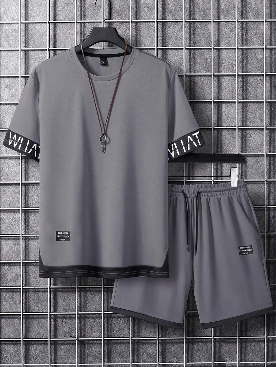 Manfinity Homme Conjunto de camiseta casual de manga corta con cuello redondo y estampado de letras, y pantalones cortos con cordón en la cintura para hombre