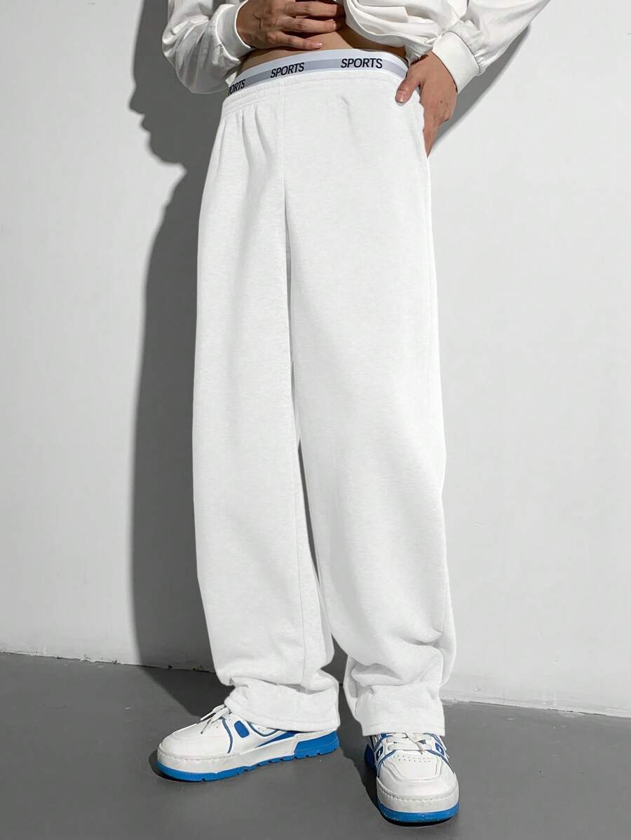 SHEIN Teen Boys Casual Loose Sweatpants With English Print, Elastic Waist Vintage Style Trousers, Suitable For Autumn, Winter, School, Home, Daily, Sports, Birthday Party, Outings, All-Match Versatile Thermal Lined