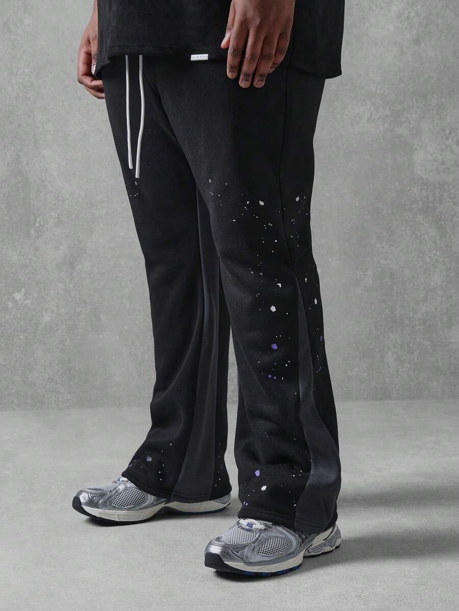 SUMWON Pantalon de survêtement ample avec éclaboussures de peinture, coupe évasée. Bas d'entraînement de mode urbaine, pantalon jogging tout saison. Tenue décontractée pour l'athléisme