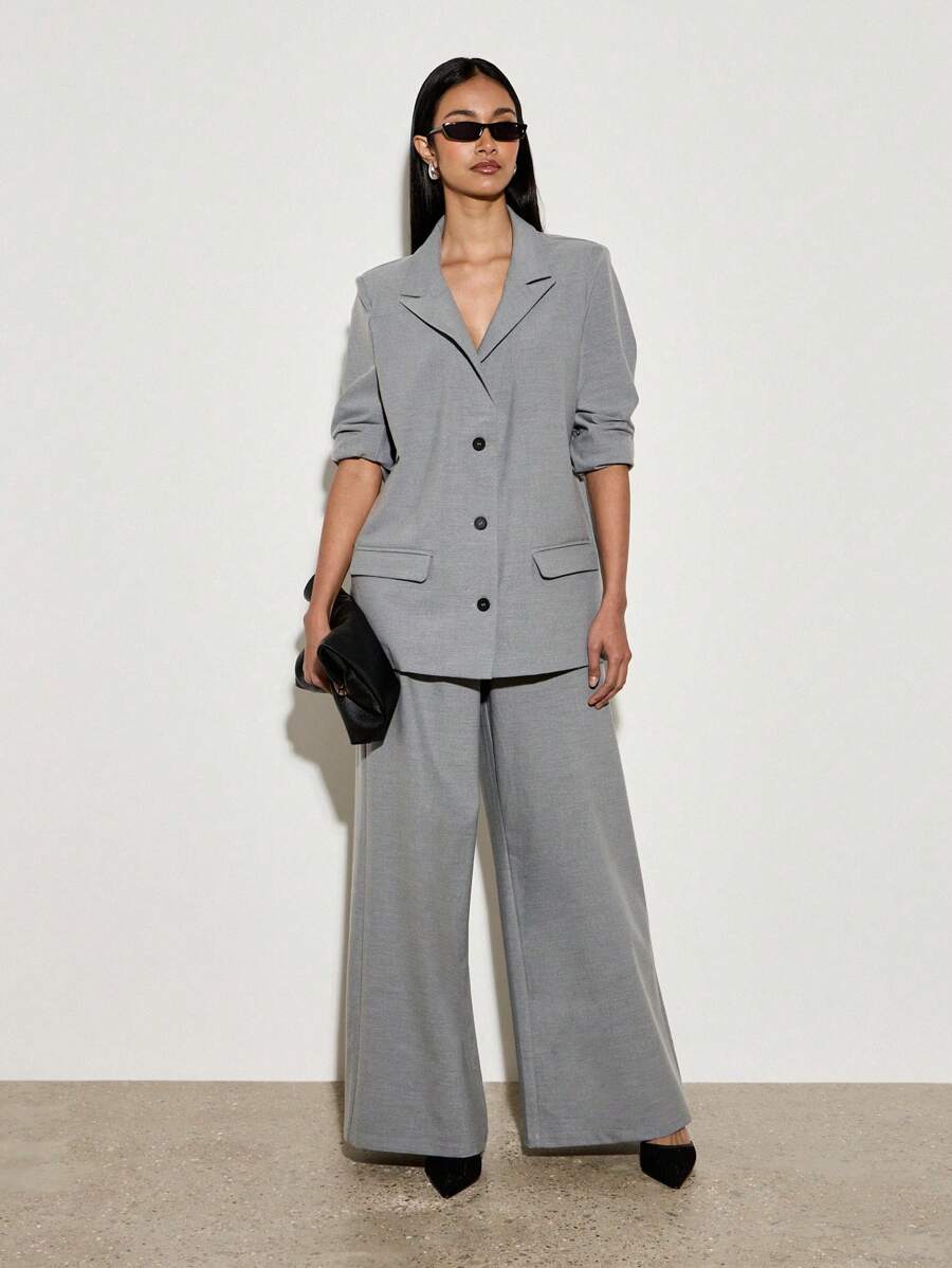 AiiRZ Ensemble veste blazer surdimensionnée et pantalon palazzo professionnel. Tailleur formel avec pantalon ample. Tenue de travail de bureau, look exécutif contemporain pour la carrière