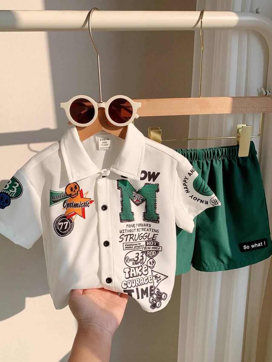 SHEIN Set de 2 piezas de ropa casual para niño pequeño, con camiseta de manga corta con estampado de letras y pantalones cortos de cintura elástica, adecuado para primavera/verano, apto para jugar al aire libre y usar en la calle