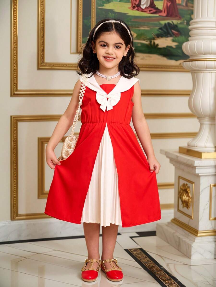 SHEIN Vestido informal suelto con cuello en V y parches de pliegues con decoración de lazo, que resalta la vitalidad juvenil, la inocencia adorable, el estilo personalizado y el entusiasmo dulce, perfecto para uso diario y fiestas, prenda esencial de primavera/verano y regalo de ropa para niñas jóvenes