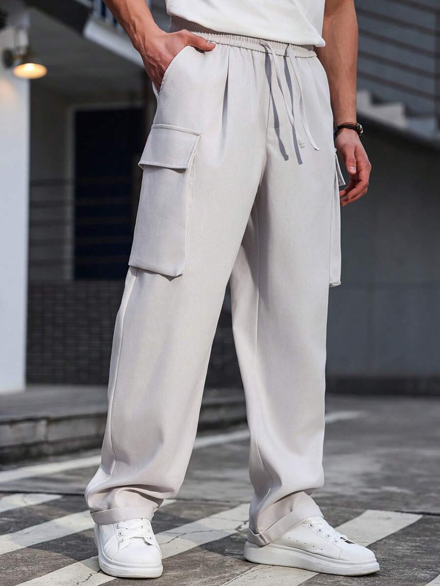 Manfinity Homme Pantalones largos casuales sólidos y versátiles de pierna recta y holgados de Manfinity, pantalones cargo, pantalones blancos para hombre