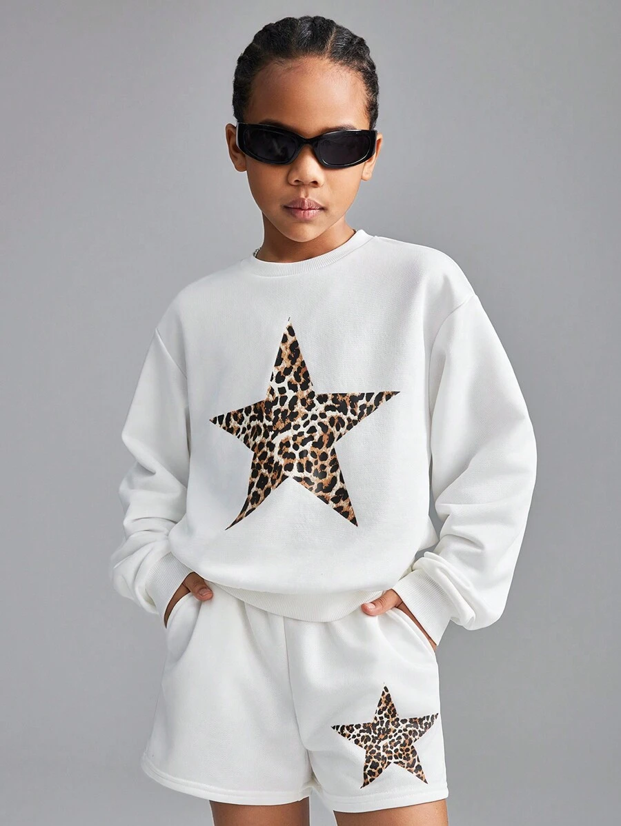 SHEIN Conjunto informal de 2 piezas de sudadera con hombros caídos y shorts con estampado de leopardo y estrellas para niñas preadolescentes, de primavera/verano, de ajuste holgado