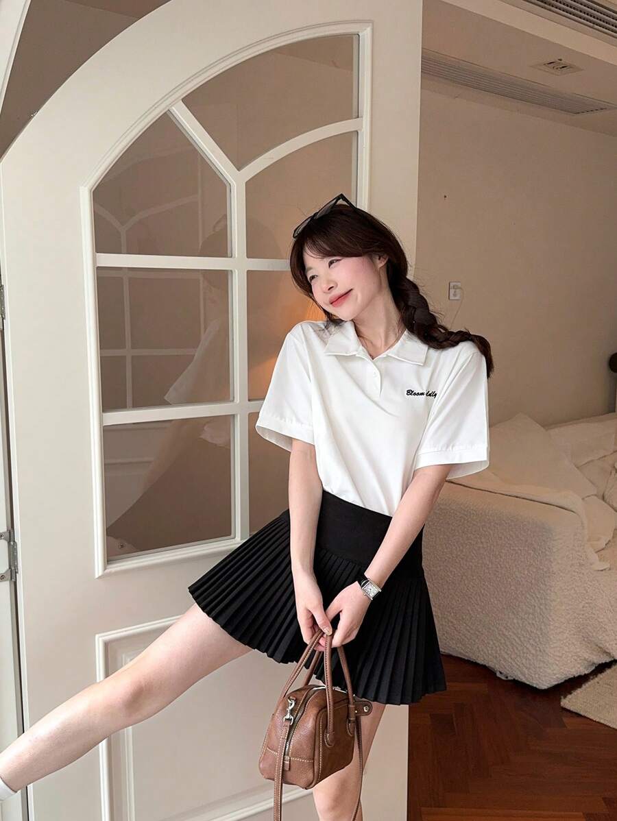 DAZY Camiseta de mujer de manga corta, cuello polo, unicolor, con bordado de letra