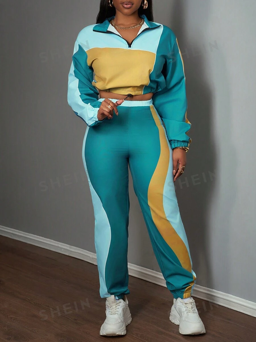 Slaydiva Conjunto informal de 2 piezas para mujer con chaqueta corta de cuello alto con cremallera y pantalón ancho de chándal con efecto color block