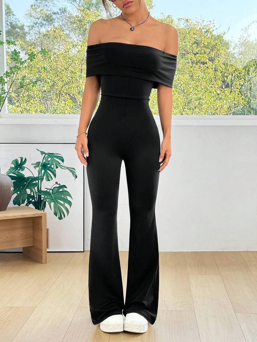 SHEIN EZwear Mono negro casual de punto holgado con hombros descubiertos y vuelo