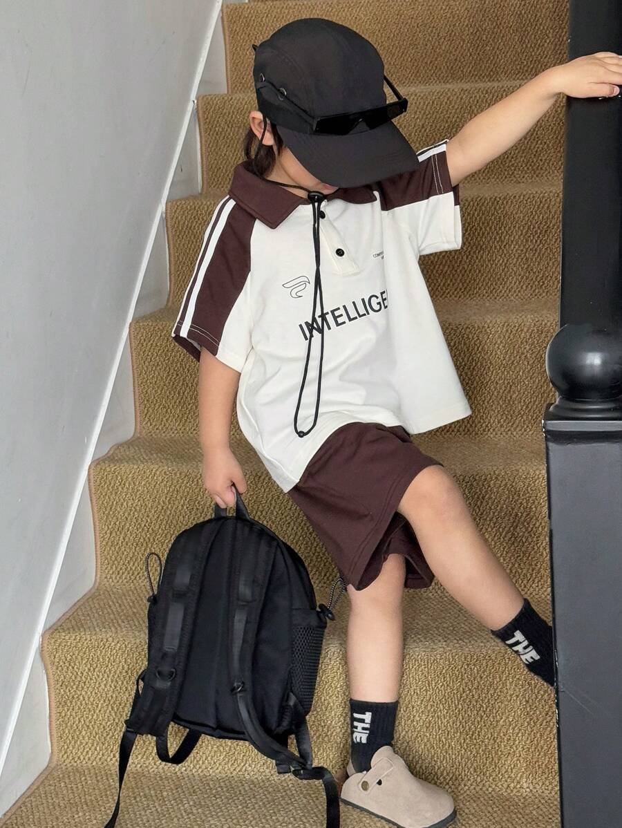 DAZY Set da 2 pezzi per ragazzo giovane, camicia polo a maniche corte raglan con stampa di lettere e contrasto di colore, e pantaloncini