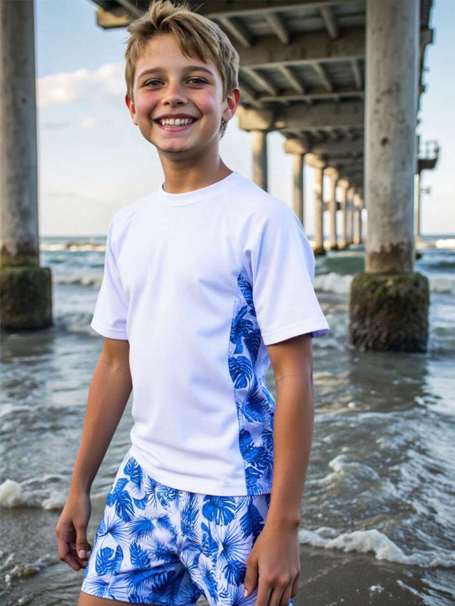 SHEIN Set de 2 piezas de traje de baño para niño preadolescente que incluye camiseta de manga corta con cuello redondo y estampado de hojas, y pantalón corto de cintura elástica, adecuado para otoño, primavera, verano, uso diario, actividades al aire libre, deportes, escuela, estilo callejero, fiestas y ocio en casa, playa, natación