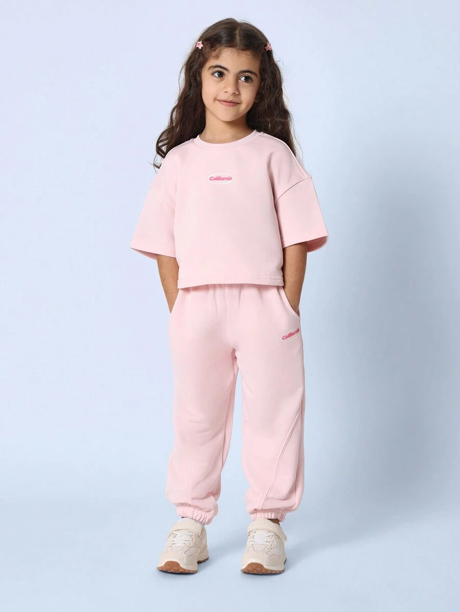 SUMWON Conjunto de ropa de estar en casa de dos piezas con logo de California, blusa corta cómoda y oversize, pantalones jogger, conjunto casual de deporte y actividad física para estar en casa