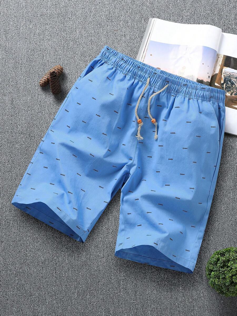 Manfinity RSRT Pantalones cortos holgados con cordón en la cintura y bolsillos, estampado de letras, para hombre. Pantalones cortos de verano para hombres, ropa de verano para hombres, pantalones cortos de hombre, pantalones cortos de playa para hombre