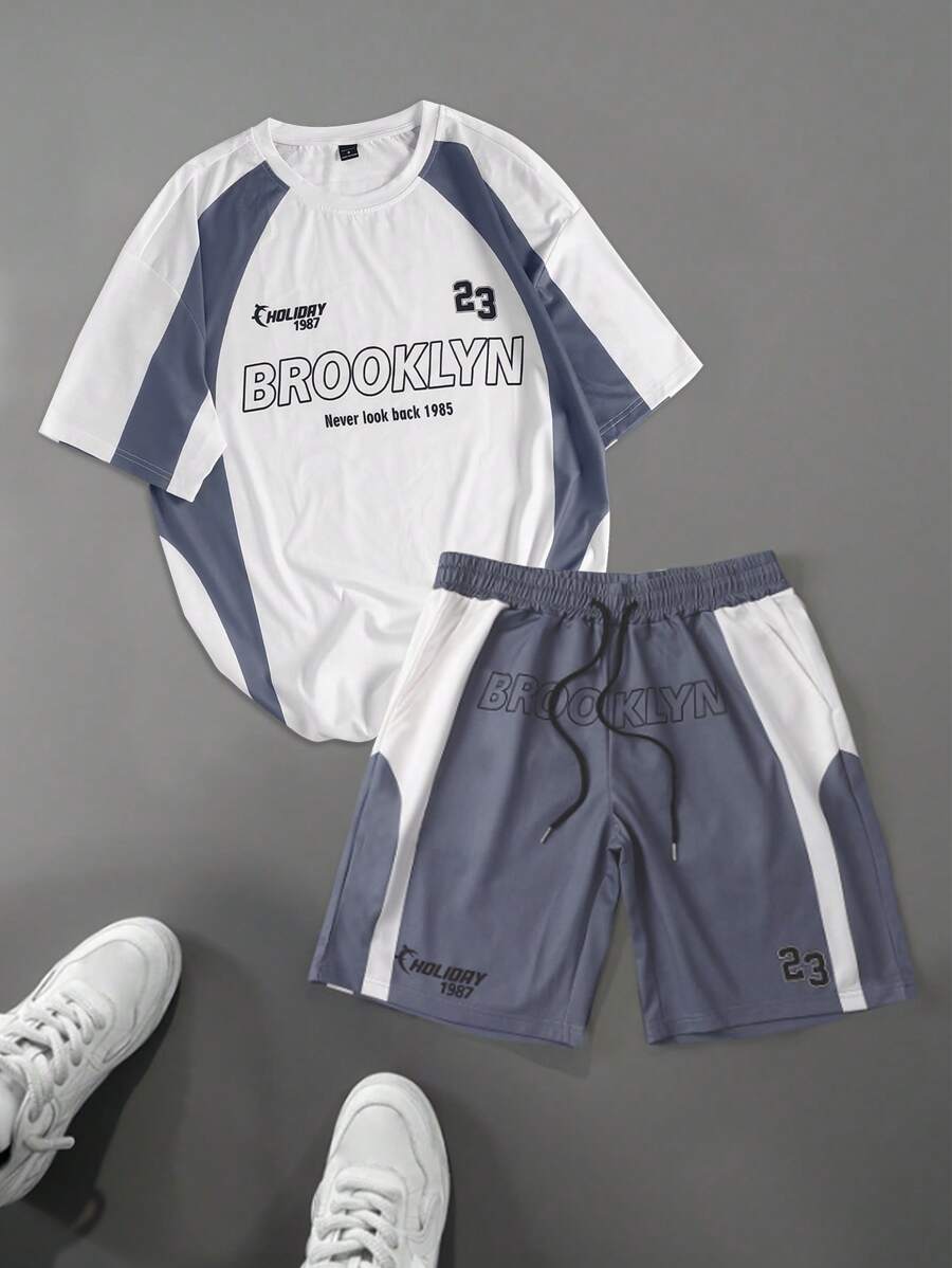 Manfinity Hypemode Conjunto de top y shorts minimalista para hombres con bloqueo de color y estampado de letras de carreras