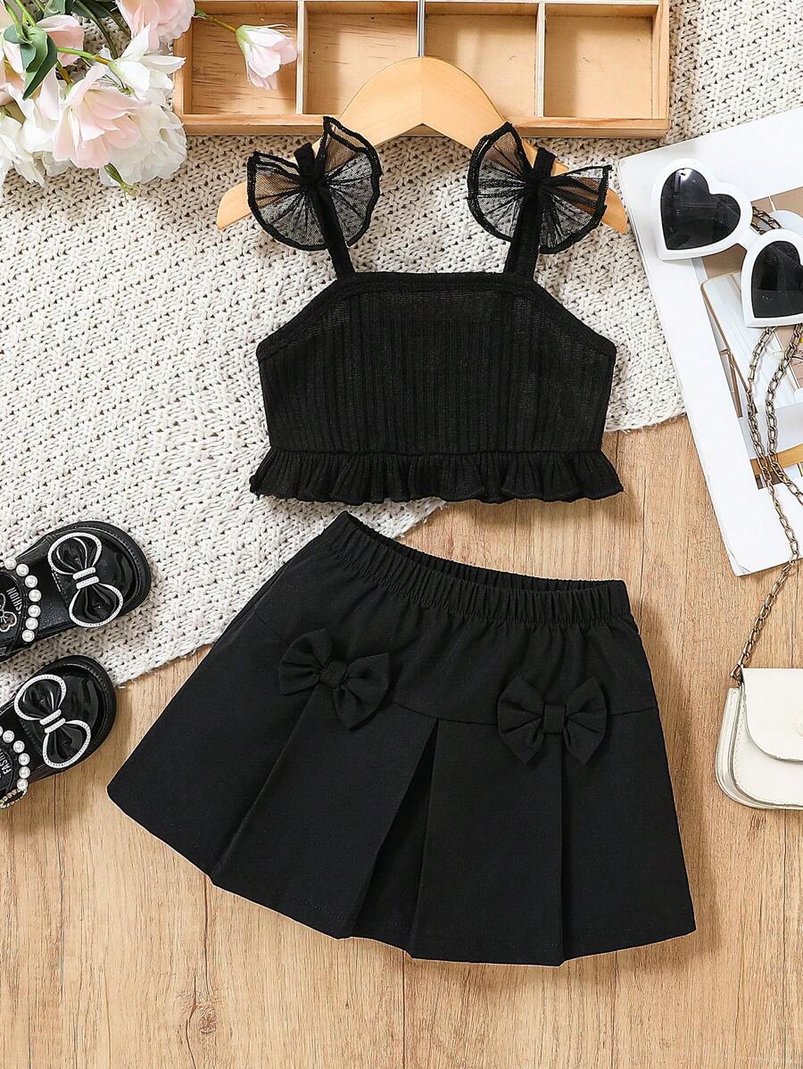 SHEIN 2-częściowy zestaw dla dziewczynek na wiosnę/lato - czarny elegancki minimalistyczny siateczkowy kokardkowy ozdobnik, dzianinowy top na ramiączkach i spódnica z kokardą