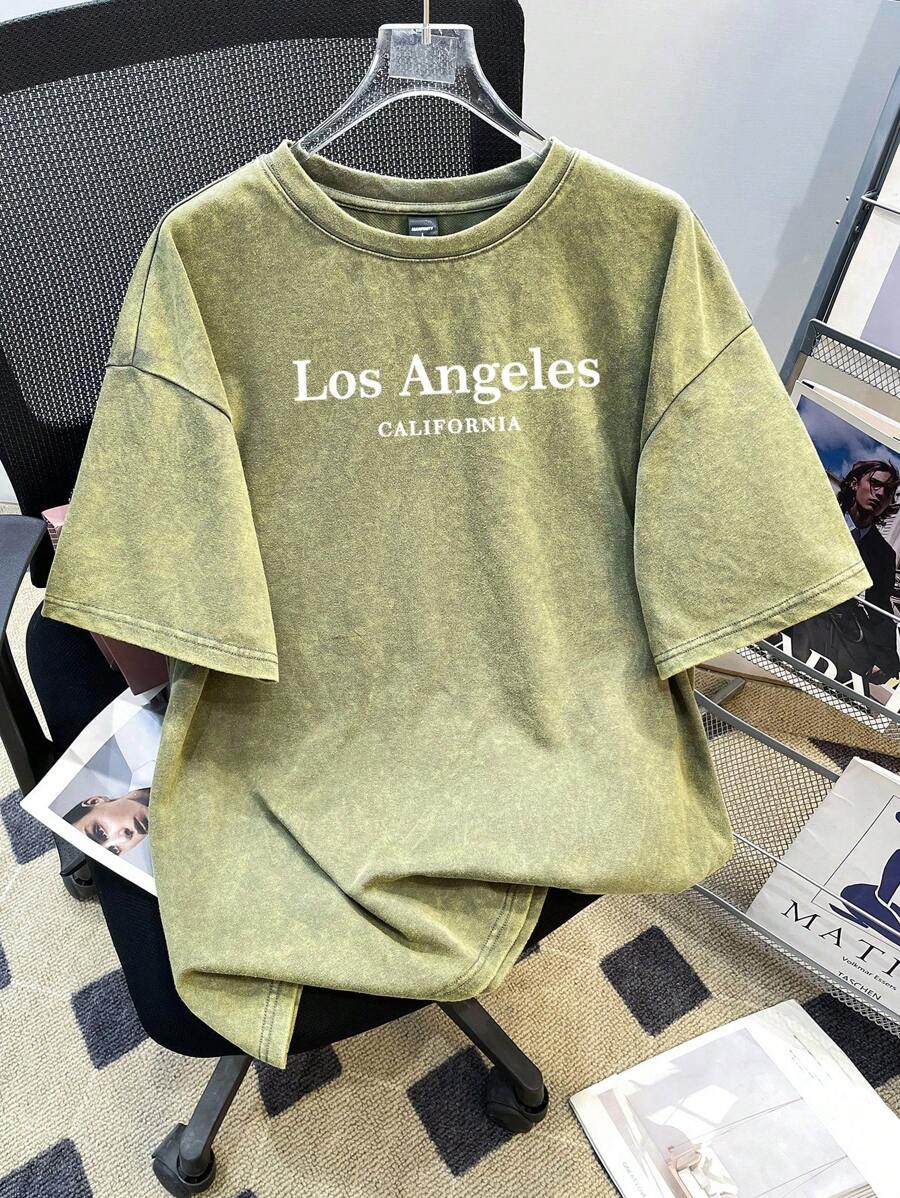 Manfinity Hypemode Camiseta holgada de manga caída mezcla de colores verde oliva con gráfico minimalista de Los Ángeles