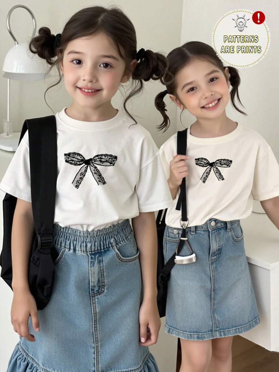 SHEIN Camiseta de manga corta y hombros caídos, corte informal, con diseño de lazo y encaje retro coreano, adecuada para niñas preadolescentes en verano
