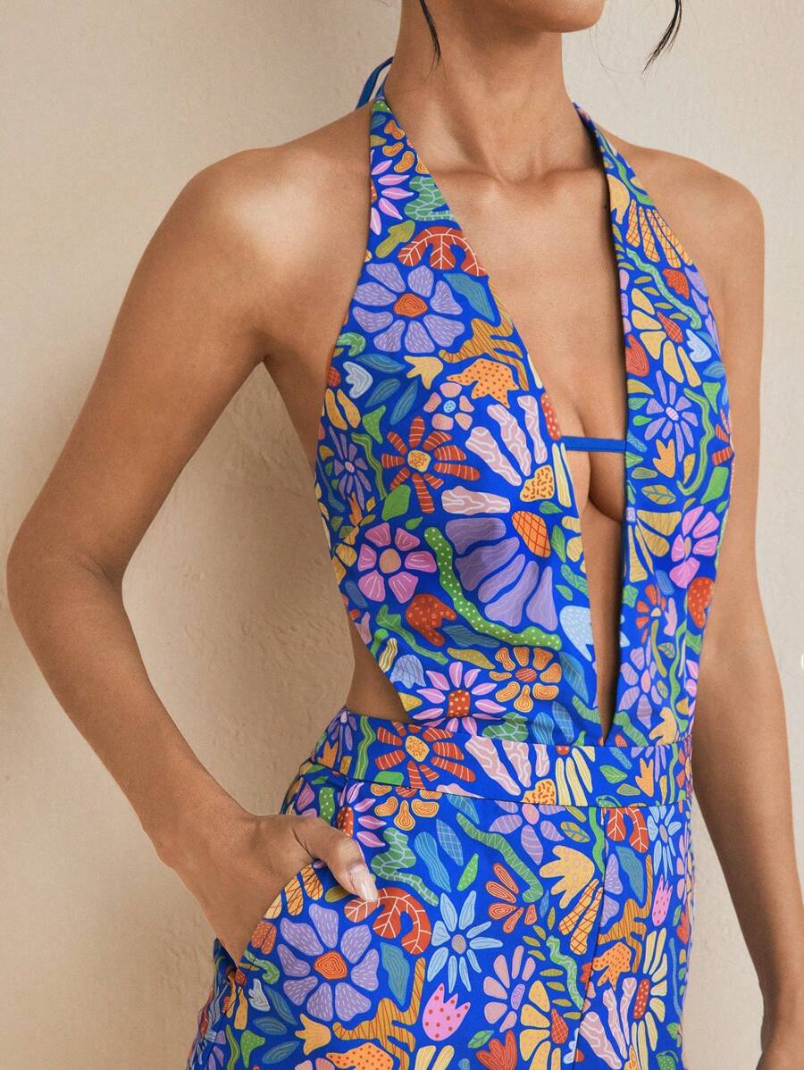 JIAN LASALA Monos azules para mujer estilo boho sin mangas con estampado floral, de espalda descubierta y nudo, para outfits de verano, vacaciones, salir, playa y ropa de verano para mujer en Europa