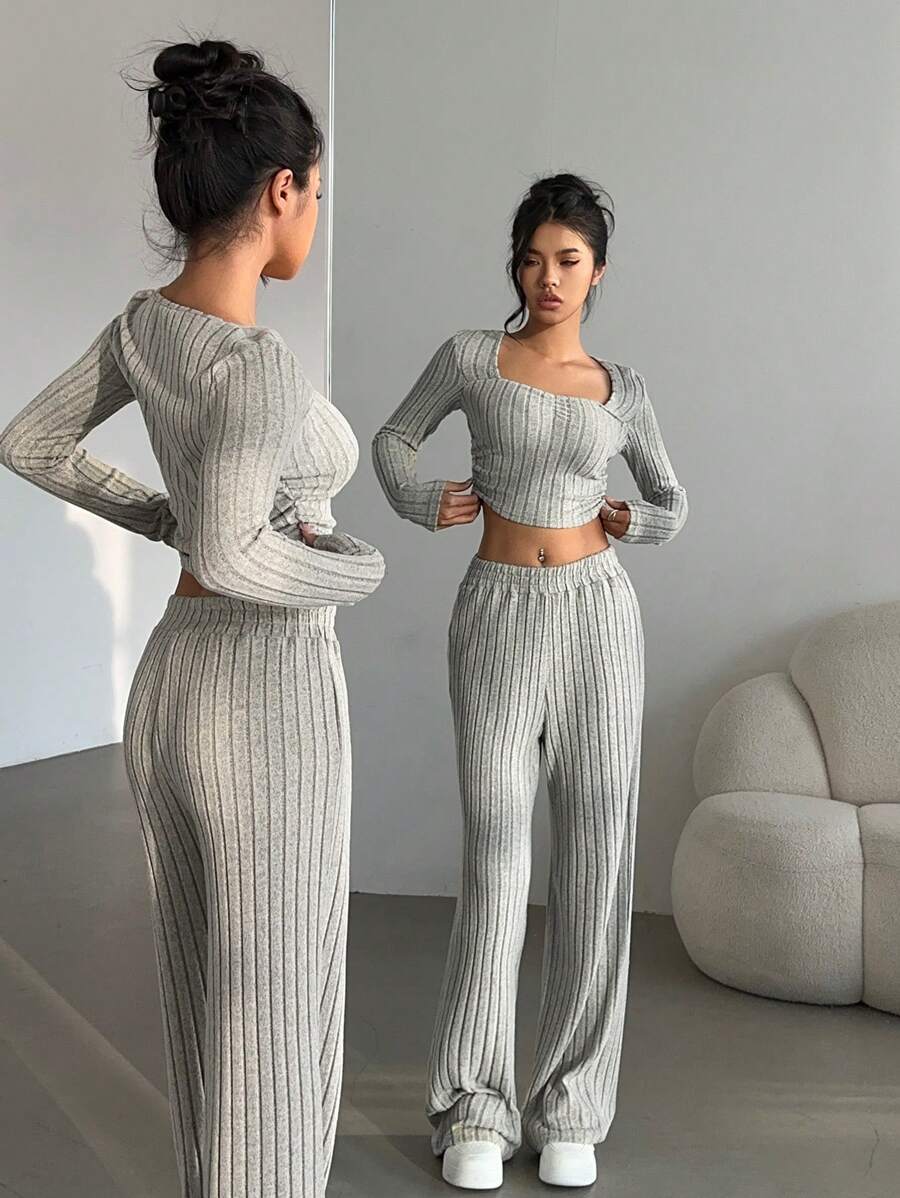 SHEIN Essnce Conjunto de 2 piezas informal de top corto de manga larga de punto acanalado y pantalones en unicolor para mujeres