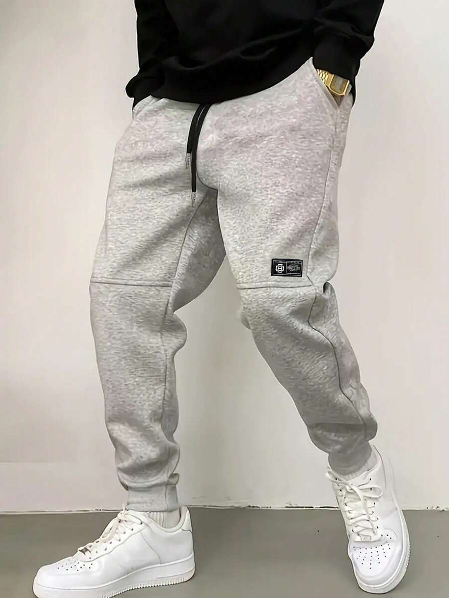 Manfinity Dauomo Pantalones casuales de hombre con cordón de color liso, de moda y sencillos
