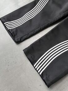 Manfinity EMRG بنطلون رجالي فضفاض بخصر مرن بطبعات نجوم وخطوط، موسم الخريف