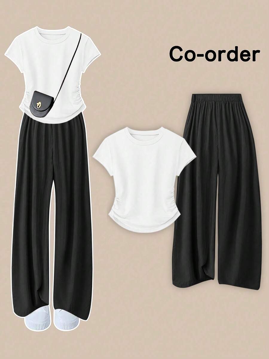 Flirla Plus-size effen ronde hals asymmetrisch geplooid T-shirt met korte mouwen en wijde broek (2-delige set), casual, veelzijdige en relaxte pasvorm voor dagelijks gebruik en feestdagen, lente/herfst