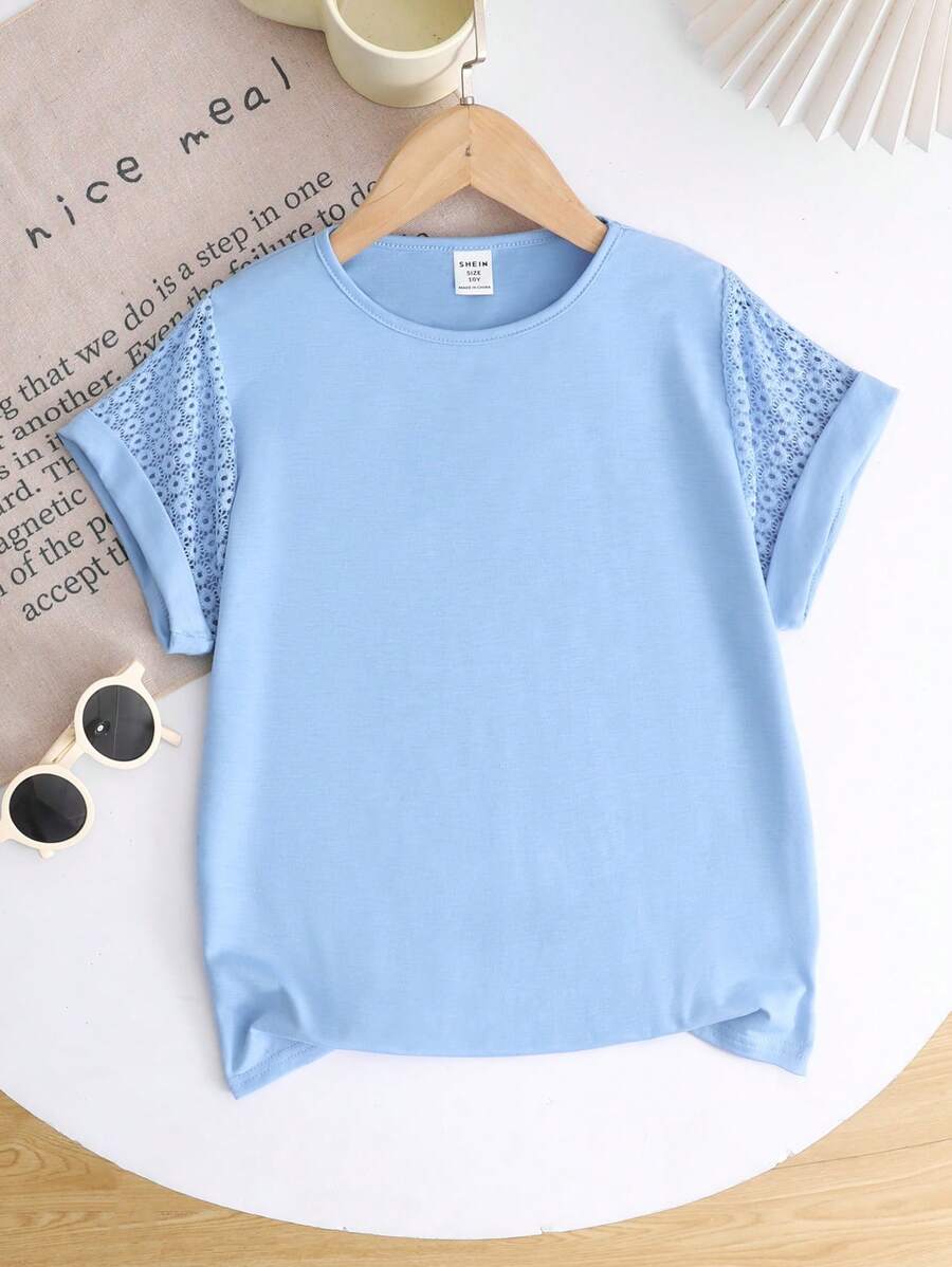 SHEIN Camiseta de manga corta casual holgada de cuello redondo lisa para niñas preadolescentes en vacaciones