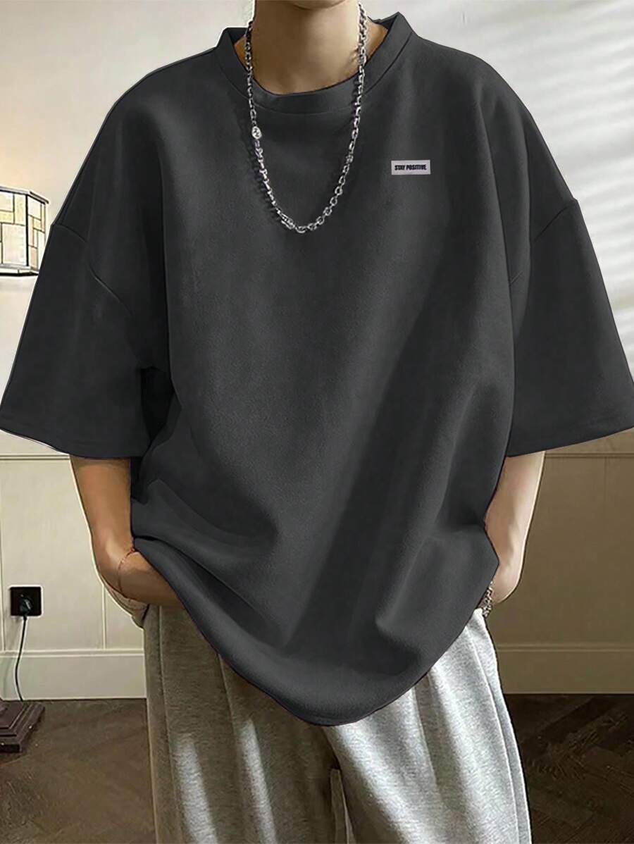 Manfinity Hypemode Plus Size Men's Loose Casual Letter Print Round Neck Drop Shoulder T-Shirt