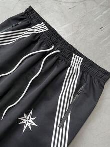 Manfinity EMRG بنطلون رجالي فضفاض بخصر مرن بطبعات نجوم وخطوط، موسم الخريف