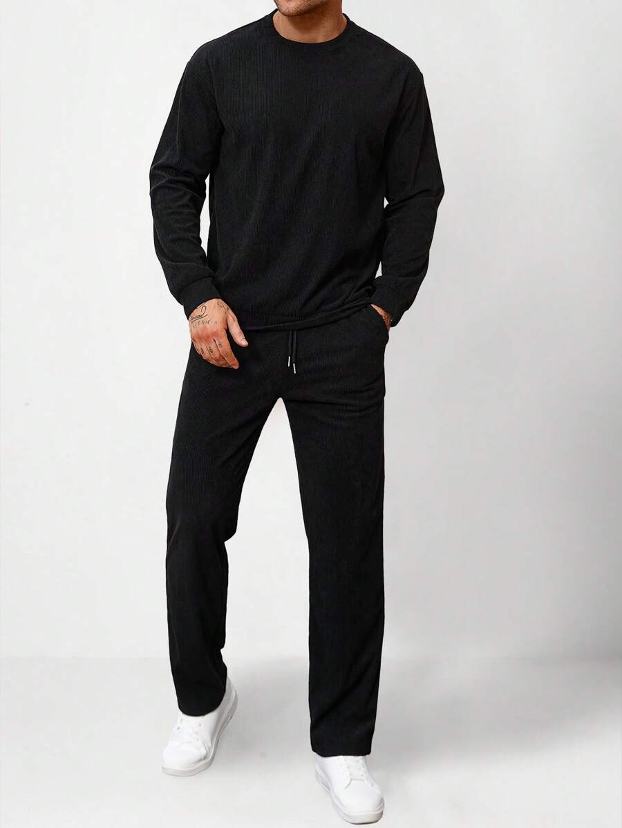 Manfinity Homme Conjunto casual de sudadera de cuello redondo de unicolor de manga larga y pantalón de chándal para hombre