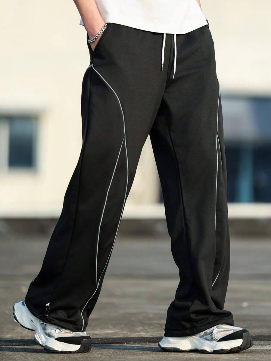 Manfinity Hypemode Men's Fashion Street Sports Style Line Stitching Design Drawstring Waist Pocket Straight Loose Sweatpants, Men's Loose Sweatpants, Foot Drawstring Design Can Be Used As Tapered Pants, Suitable For Daily Wear, Going Out, School, Meeting Friends. Can Be Given To Friends, Boyfriends, Sons.Men's Solid Color Sports Pants