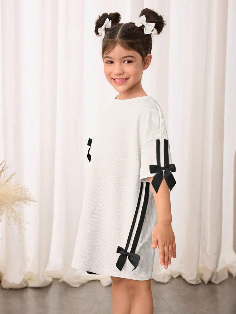 SHEIN Vestido camiseta de punto holgado de unicolor con cuello redondo para niña casual