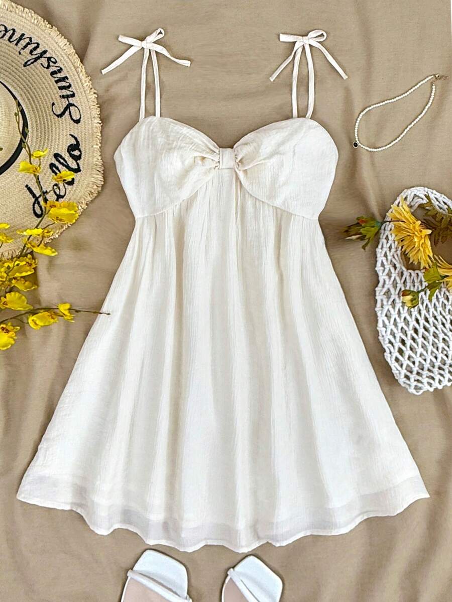 SHEIN Teen Girls Solid Color Casual Sleeveless Spaghetti Strap Dress For Spring And Summer, Bow Accent, Cute/Girly