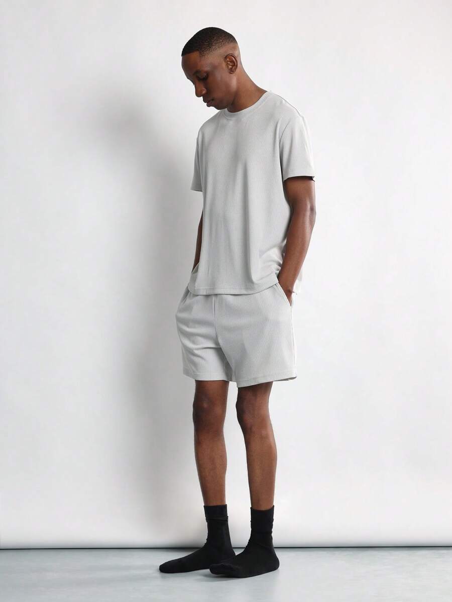 SUMWON Conjunto de ropa de estar en casa de dos piezas con costillas, ajuste relajado, camiseta de manga corta y shorts con cintura elástica, ropa de verano para usar cómodamente en actividades ligeras