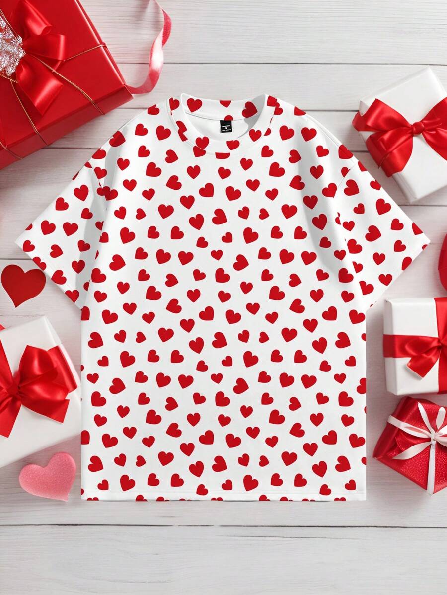 Manfinity VCAY Camiseta de manga corta unisex de corte holgado, cuello redondo y hombros caídos con estampado de pequeños corazones en todo el diseño
