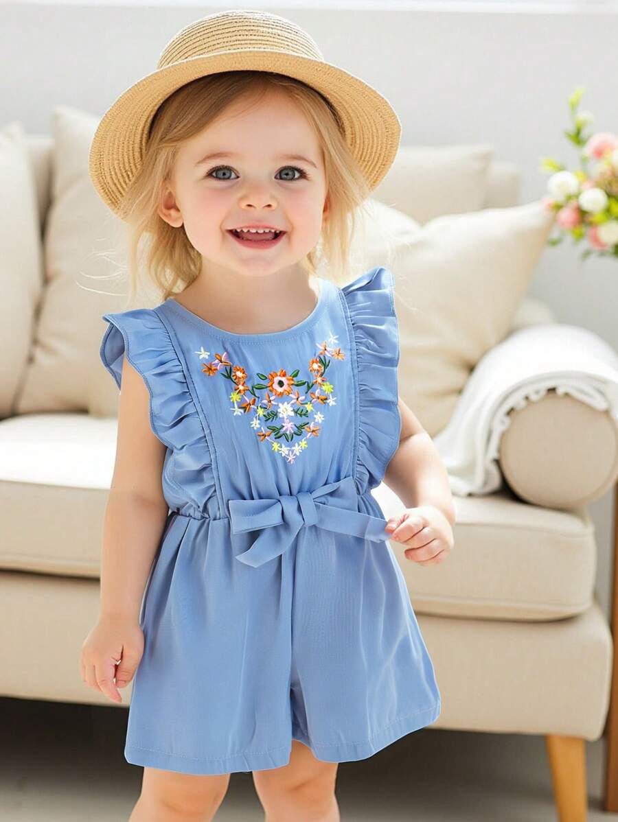Baby Girl Spring/Summer New Leisure Vacation Style Blue Romper, Made Of Lightweight Denim Effect Fabric, With Floral Embroidery And Ruffle Short Sleeves, Creating A Sweet And Fresh Vibe