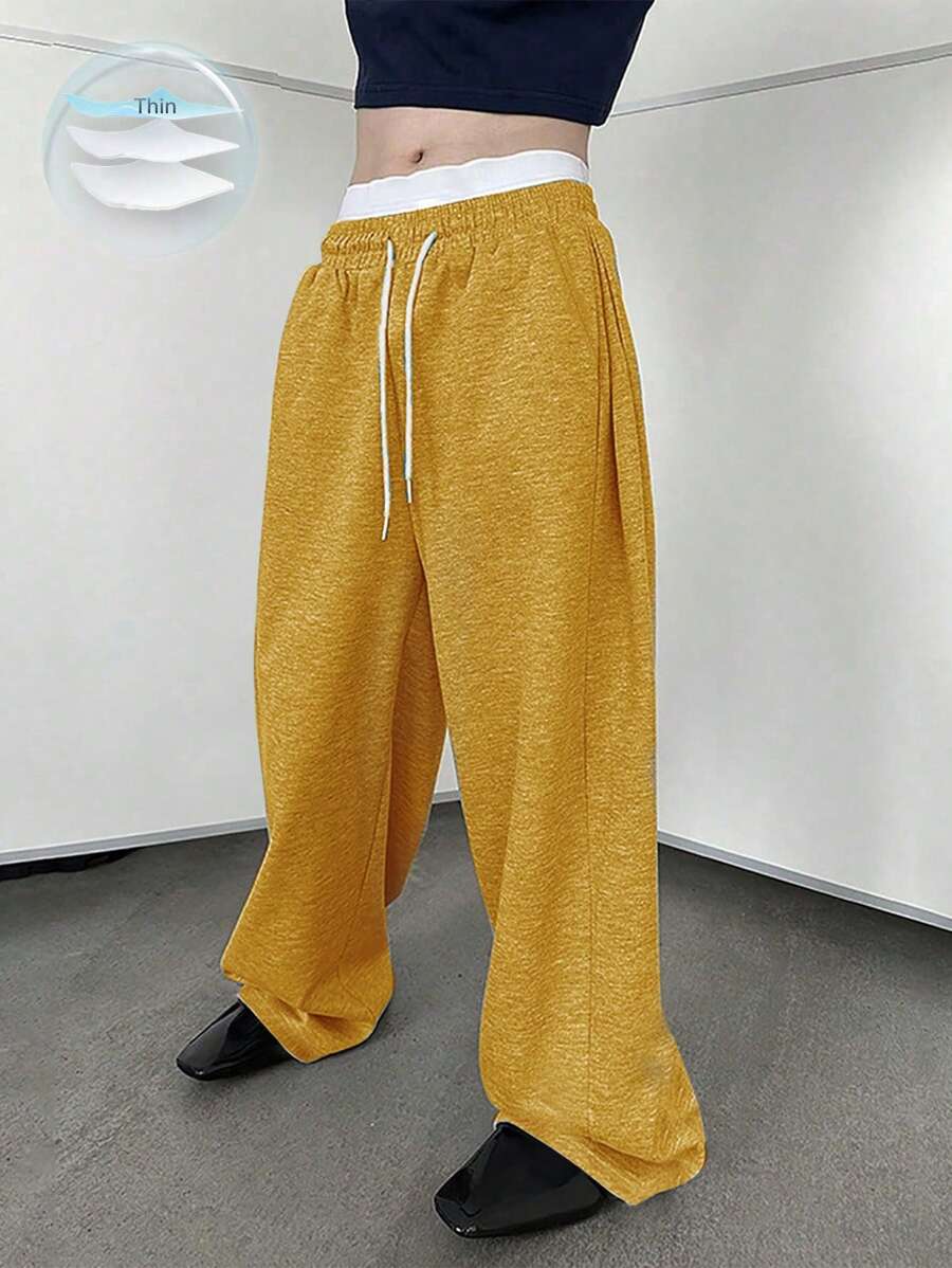 Manfinity Hypemode Pantalones de chándal de pierna ancha con cordón en la cintura para hombres, pantalones anchos y sueltos tipo jogger, pantalones holgados de color negro Y2K para hombres