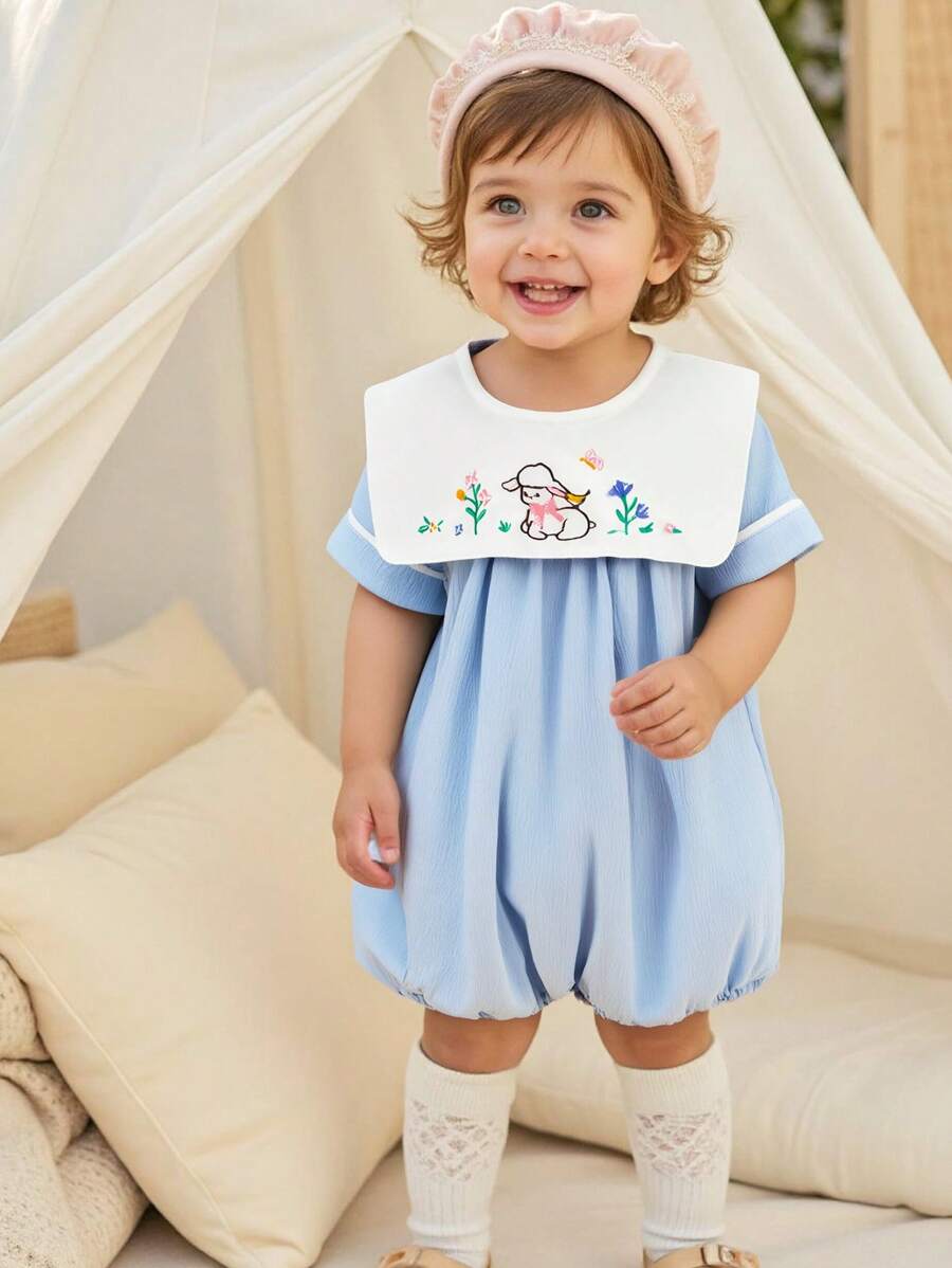 Souflis Souflis Babymeisjes marineblauwe kraag schattige schapen borduurwerk korte mouwen drukknoop kruis romper voor de zomer