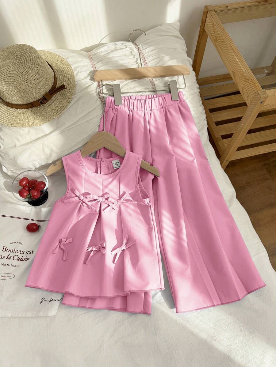 Genkimix Kids Set de 2 piezas de top sin mangas con pliegues y lazo en color morado sólido, y pantalones holgados con pliegues, un conjunto de ropa de verano estiloso para niñas jóvenes