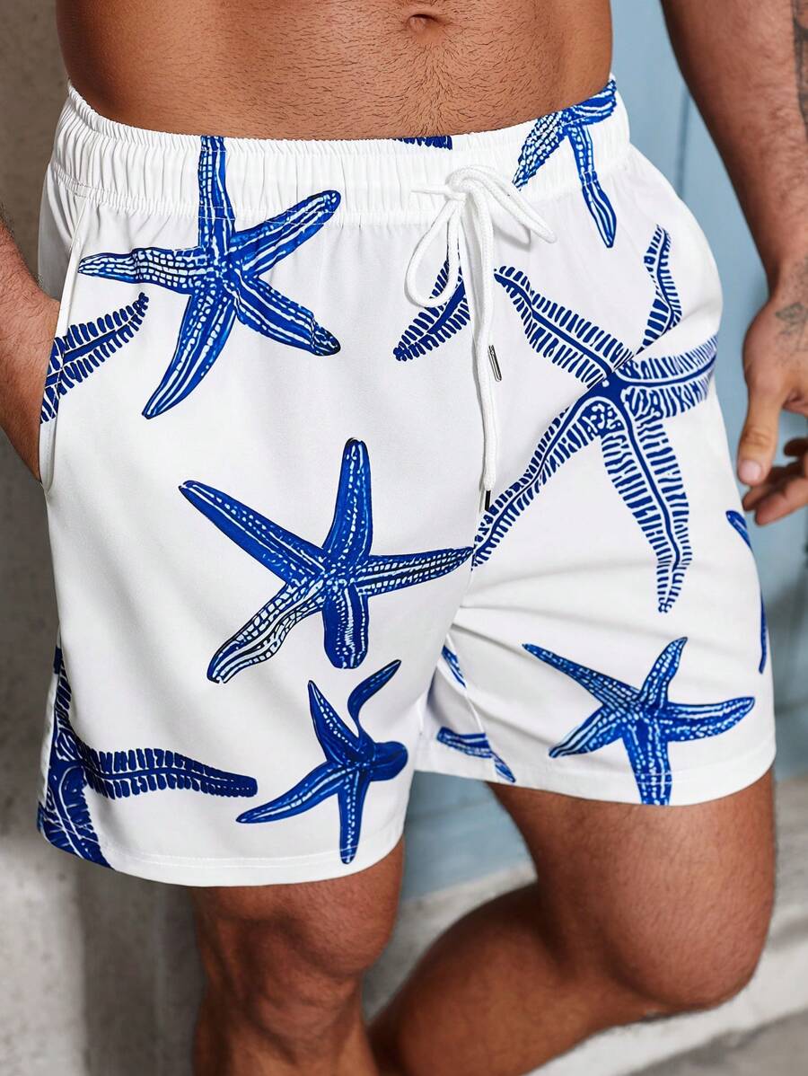 Manfinity VDAYZ Short de plage avec cordon de serrage à la taille et poches, imprimé étoiles de mer. Maillots de bain assortis pour homme. Maillots de bain pour hommes. Tenues de plage pour hommes. Shorts de maillot de bain pour hommes. Maillots de bain plus avec étoiles de mer pour hommes, hawaïen