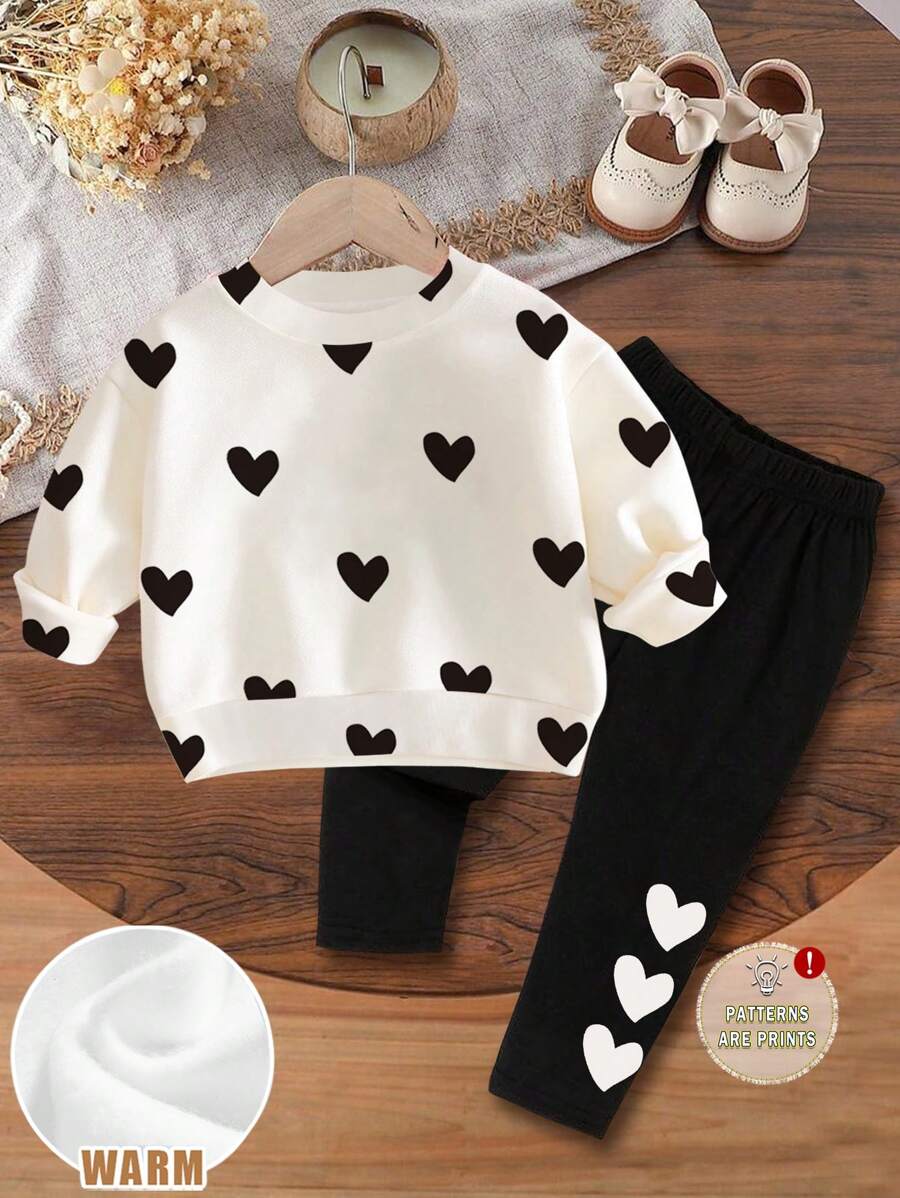 SHEIN 2pcs Baby Girl Casual Lovely Sweet Heart Pattern White Knit Soft Thick Crew Neck Long Sleeve Sweatshirt And Black Leggings Set, Suitable For Autumn/Winter