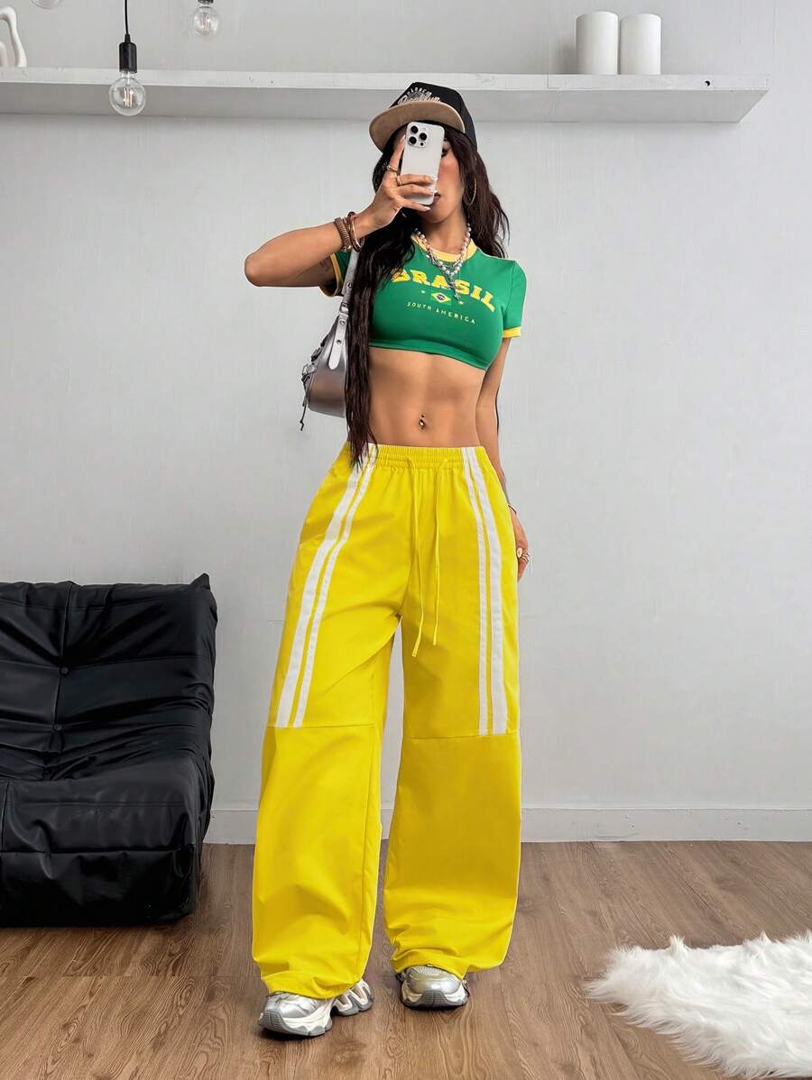 Coolane Pantalones de tiro bajo de tejido para deportes Streetwear y ropa deportiva de mujer con cinta de bloque central