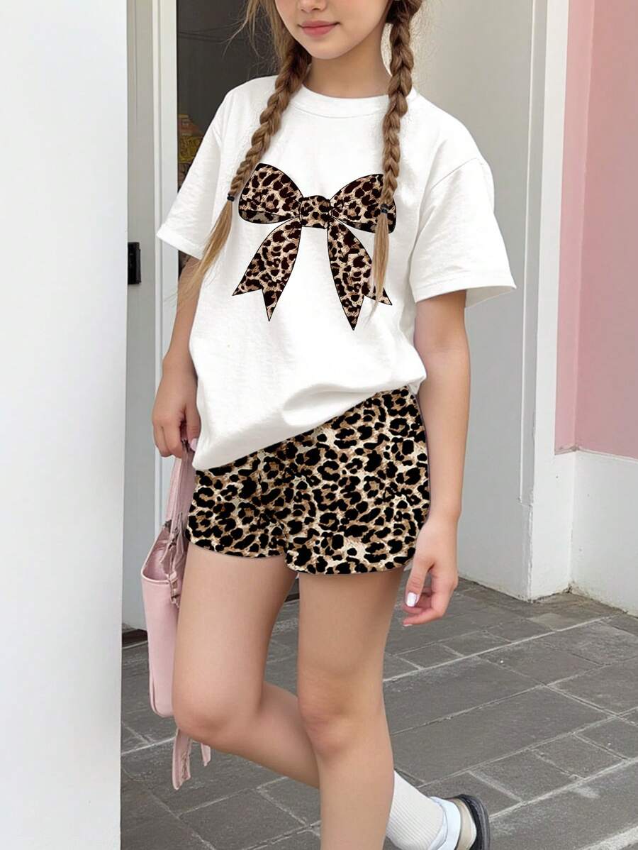 SHEIN Set de 2 piezas con camiseta de manga corta y pantalón corto con estampado de leopardo y decoración de lazo, apropiado para el verano, para niñas preadolescentes