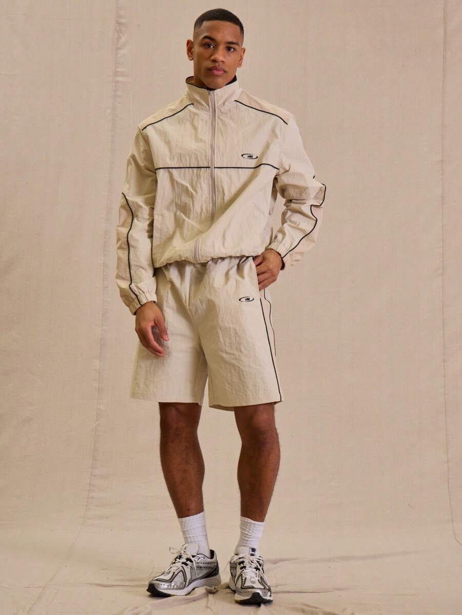 SHEIN X ELOISA & ORSON Musero Pantalones cortos de chándal con panel de concha y logotipo "M" para hombres