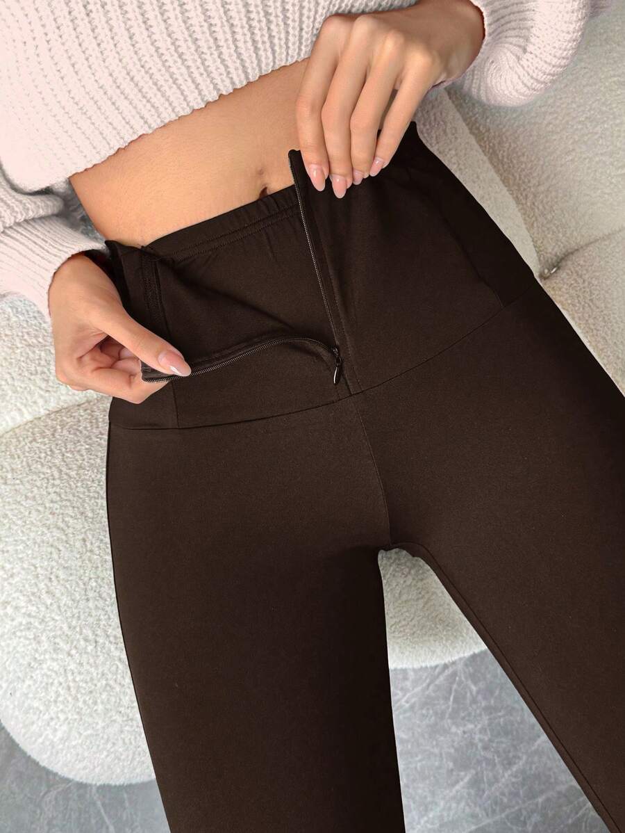 SHEIN Privé Plus Size Lente/Zomer/Herfst Elegant Casual Dagelijks Woon-werkverkeer Sport Hoge Taille Met Zak Rits Leggings Zwarte Flares Broek
