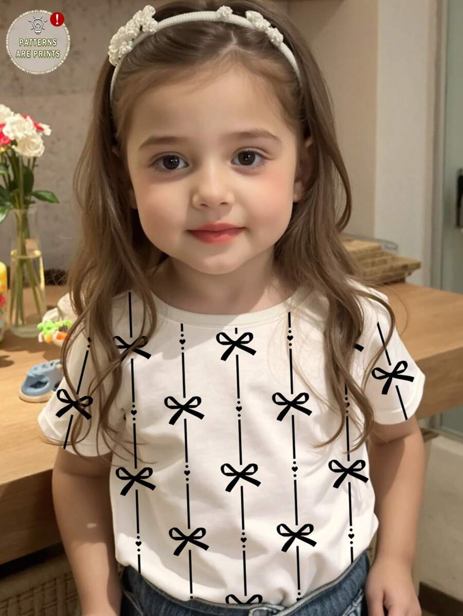 SHEIN Young Girl Cute Striped Bow Print Casual Minimalist Round Neck Short Sleeve T-Shirt, Suitable For Summer