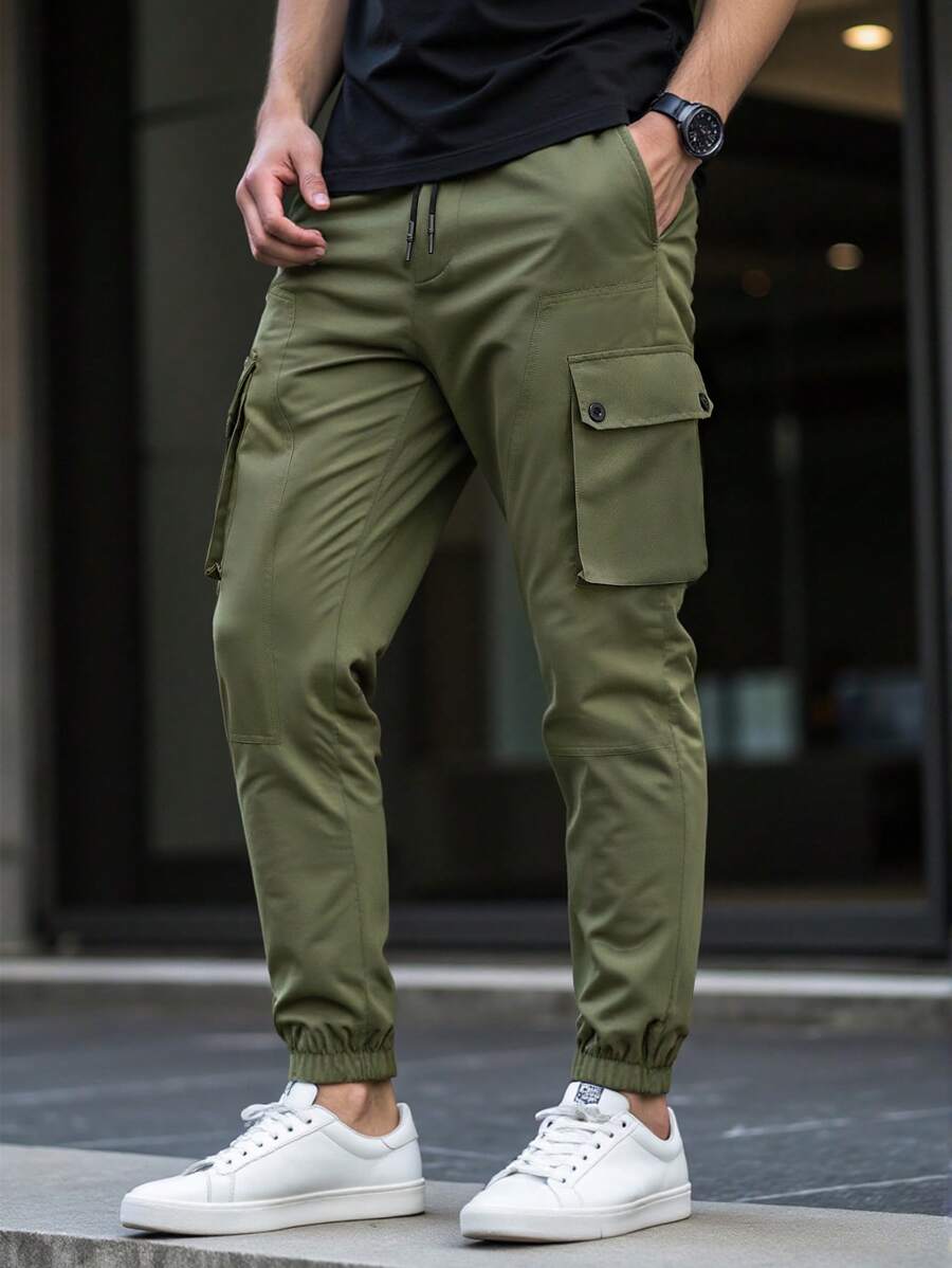 Manfinity Homme Pantalones casuales sueltos de unicolor con bolsillos cargo y cordón en la cintura para hombres